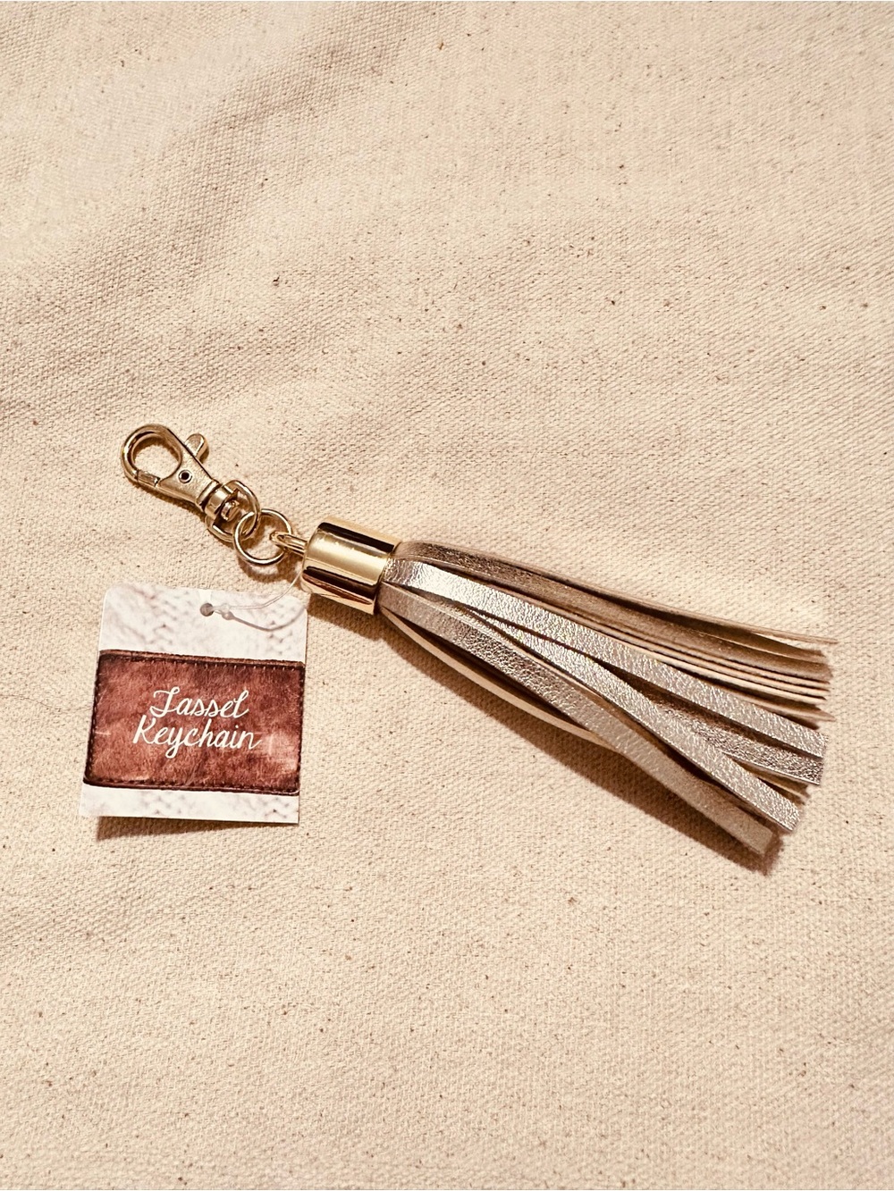 Boutique | Charm | Faux Leather Gold Tassel Charm